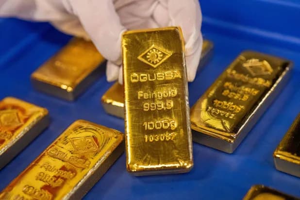 Inflation Woes and Firmer Dollar Drag Gold Lower as US-Iran Tensions Revive