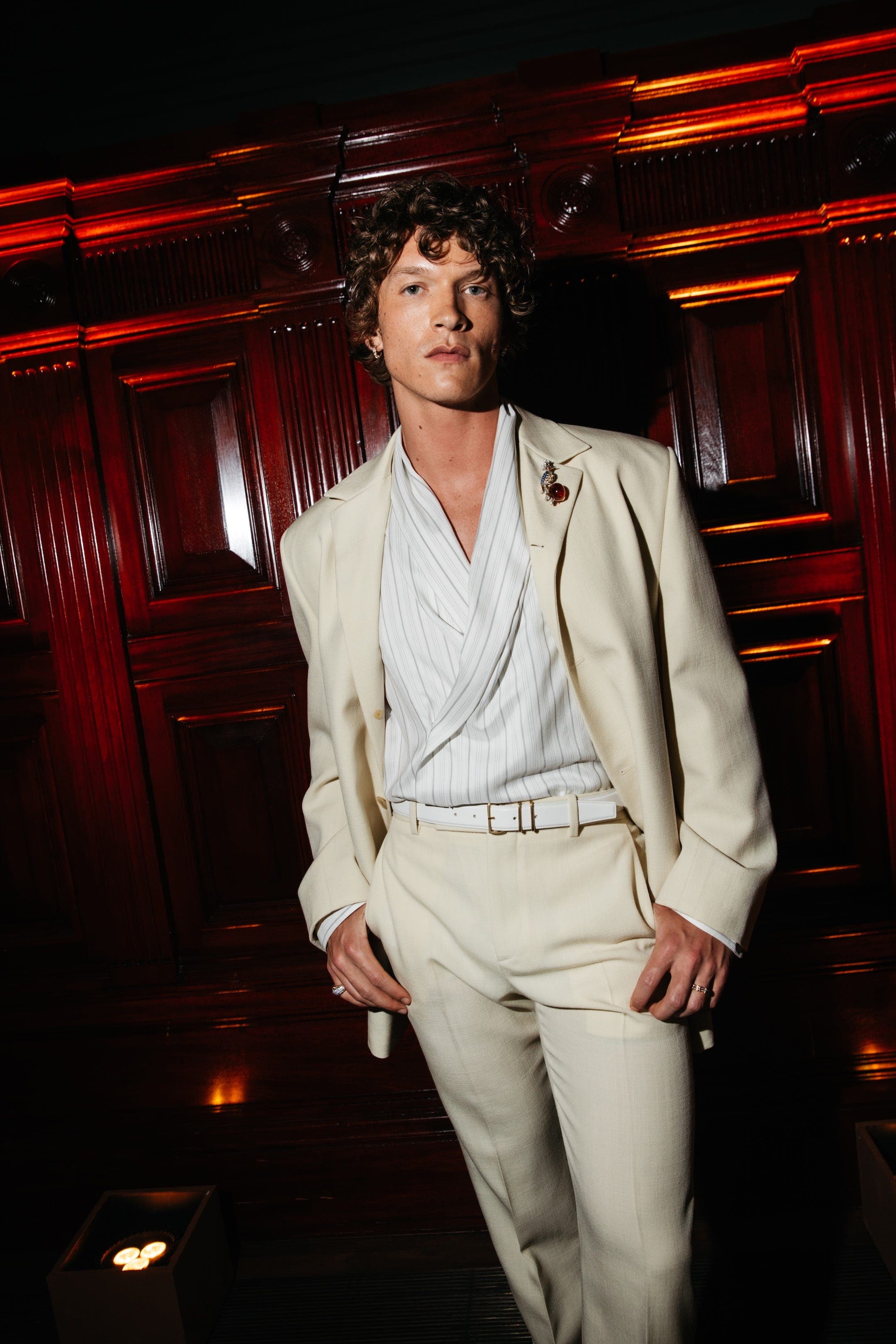 Connor Storrie Channels Old-School L.A. in a Silky Cream Suit and Wrap Top