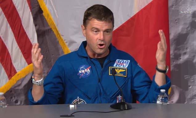 NASA astronaut finds God after returning to Earth: Reid Wiseman breaks down in tears after seeing a cross - as he claims 'it's very hard to fully grasp what we just went through'