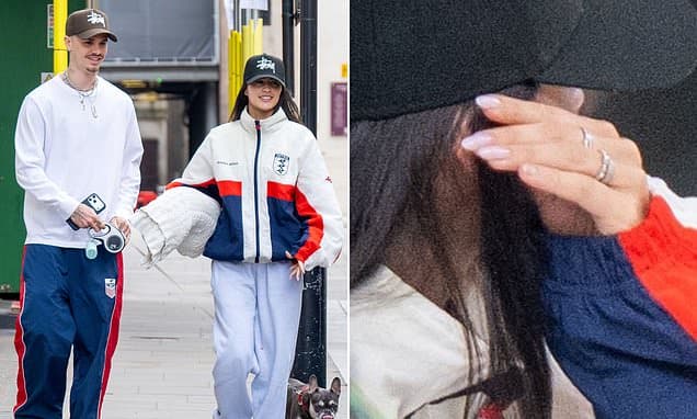 Romeo Beckham's girlfriend Kim Turnbull sports dazzling diamond ring on her wedding finger as couple enjoy loved-up lunch date