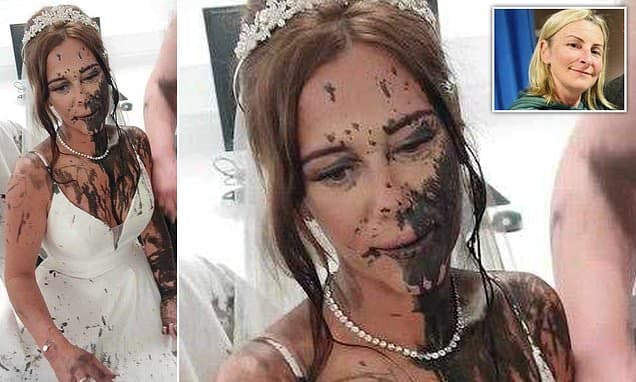 Bride's white wedding dress is covered in black paint moments before she walked down the aisle in 'revenge' attack by her sister-in-law