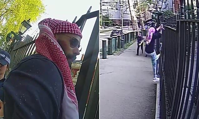 Moment small boat migrant leapt up a fence and 'tried to break into London's Israeli embassy to carry out knife terror attack'