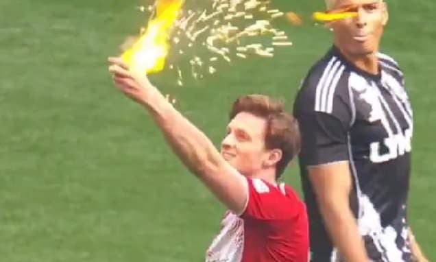 Bizarre moment YouTube star sets FIRE to yellow card in Sidemen charity match at Wembley - after being booked by ex-Premier League referee