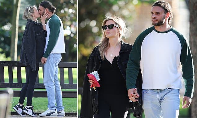 Holly Valance pictured kissing her new flame... who previously worked as a bodyguard at family home