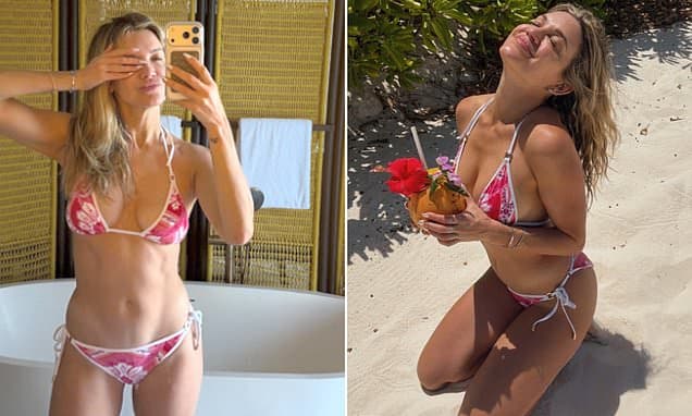 Pussycat Dolls star Ashley Roberts, 44, shows off her incredible figure in a pink floral bikini as she shares sizzling snaps from girls' trip to the Maldives