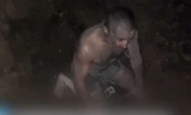 Russian commander forces refusenik soldier to crawl like a dog, eat dirt and threatens to strap a landmine to him in leaked torture footage