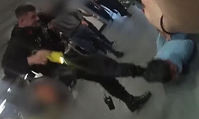 Armed policeman caught on CCTV kicking suspect at Manchester Airport tells jury his only other option was to use his Glock semi-automatic pistol