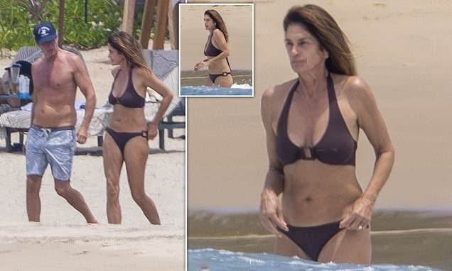 Cindy Crawford, 60, shows off her bikini body as she enjoys a beach day with husband Rande Gerber in Mexico