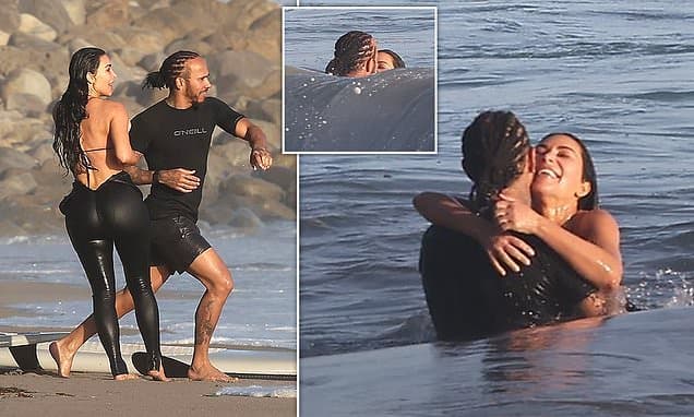 The subtle signs that show Kim Kardashian and Lewis Hamilton's romance really is 'the real deal' as they canoodle on California beach