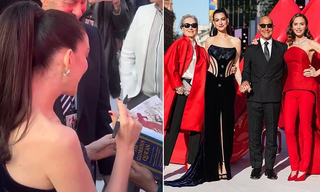 Anne Hathaway is gifted a copy of the Qur'an by a fan at The Devil Wears Prada 2 premiere after being praised for using 'Inshallah' in an interview while promoting the film