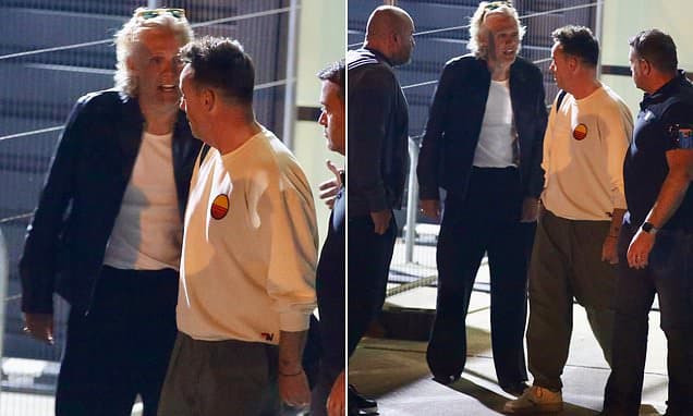 Ant McPartlin is surrounded by security as he comes face to face with Jimmy Bullard while leaving ITV studios after host insisted Adam Thomas was 'not intimidating' during tense I'm A Celeb showdown