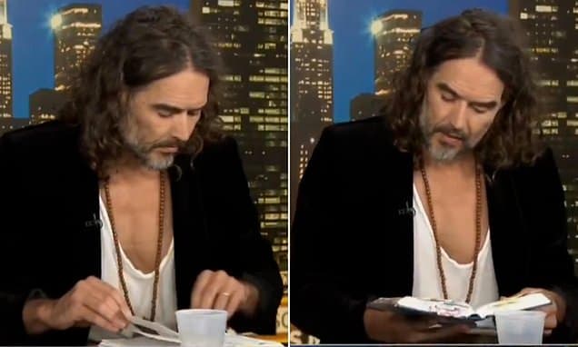 Moment Russell Brand fails to find Bible passage he read in court in excruciating 90 second clip - after admitting he fears going to prison