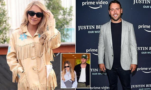 Sydney Sweeney sits on boyfriend Scooter Braun's shoulders as couple cozy up at Stagecoach festival