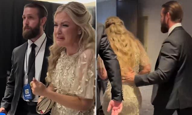 Distraught Erika Kirk sobs 'I want to go home' as she is rushed to safety following White House Correspondents' Dinner shooting