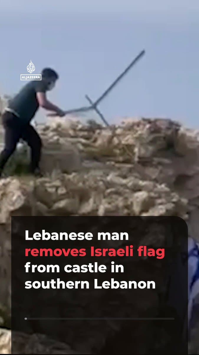 A Lebanese man who returned to his village in southern Lebanon after the temporary ceasefire was announced removes the Israeli flag from Beaufort Castle (Qalaat al-Shaqif). The castle which dates back to the 12th century is in the Nabatiyeh Governorate. pic.
