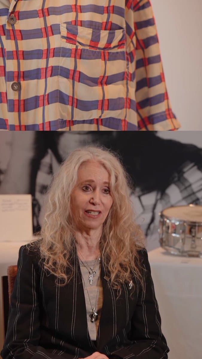 An upcoming auction is set to feature various items donated by English singer Phil Collins, including his drums and clothes such as the patterned shirt he wore at the 1985 Live Aid concert. pic.