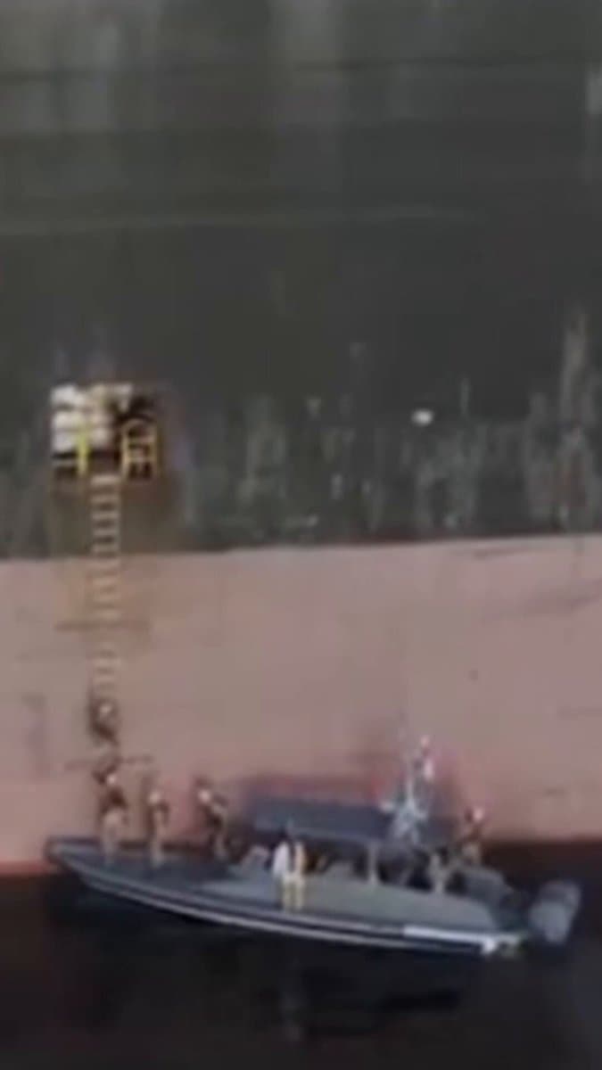 Video aired on Iranian state TV in the early hours of April 23 purportedly showed armed soldiers boarding two container ships in the Strait of Hormuz.