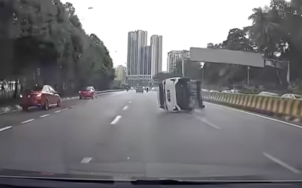 Dashcam drama: SUV flips and skids across KL highway in heart-stopping near miss (VIDEO)