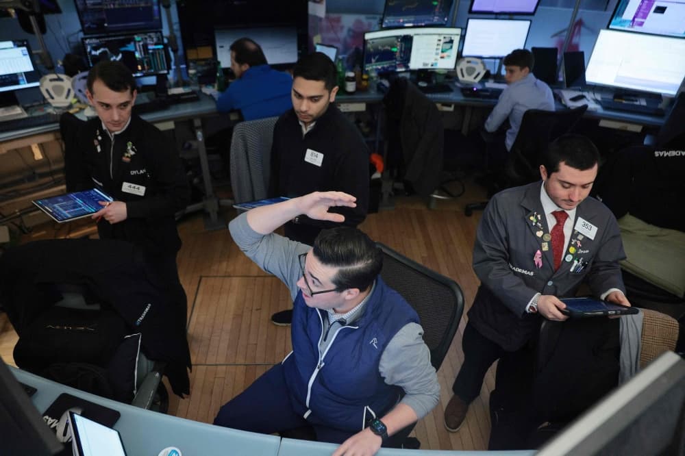 Global stocks fall despite record earnings as oil tops US$100 on US-Iran crisis