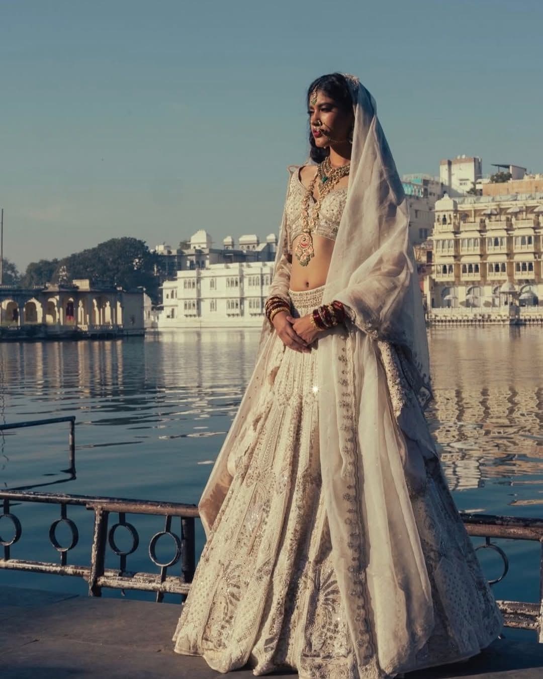 When everyone is wearing a white bridal lehenga, Indian designers explain how to make it personal