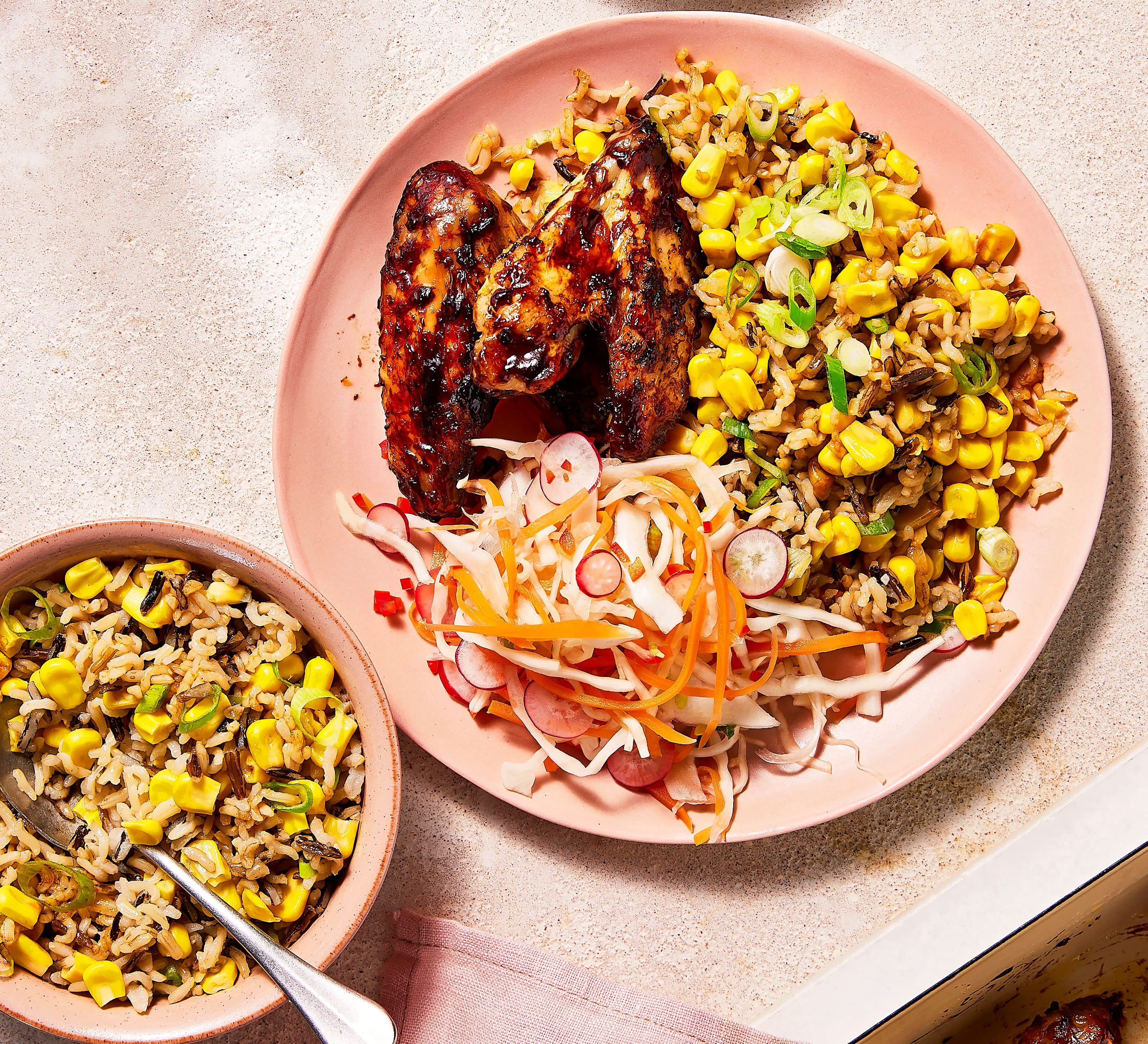 Sticky chicken wings with pickled slaw & corn salad