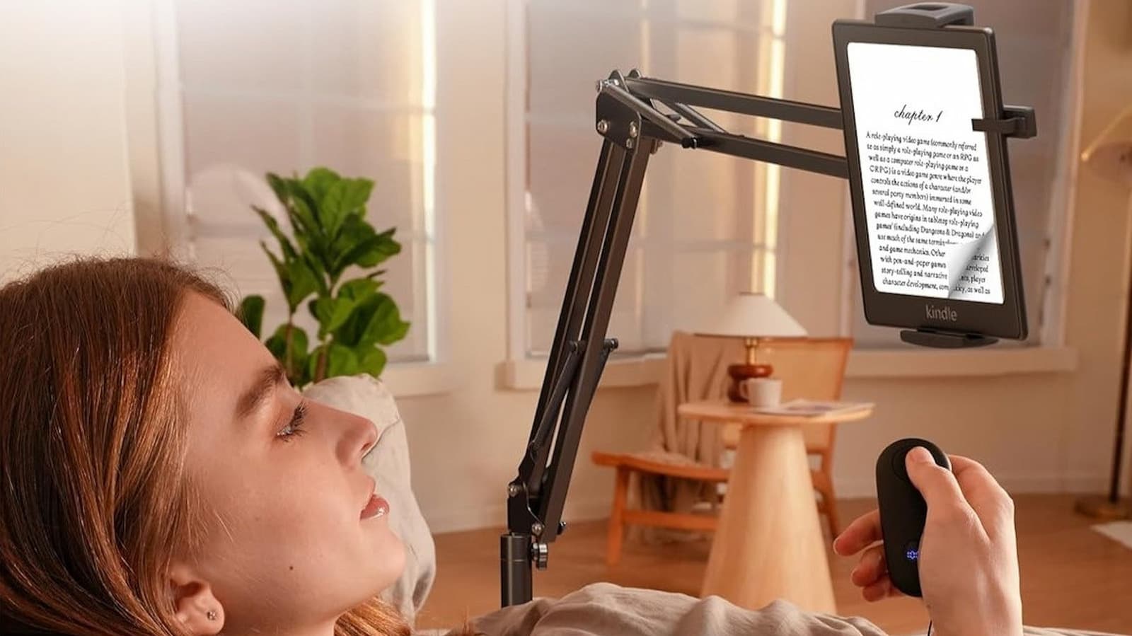 If You're Reading Your Kindle On The Couch, This Amazon Gadget Is A Must-Own