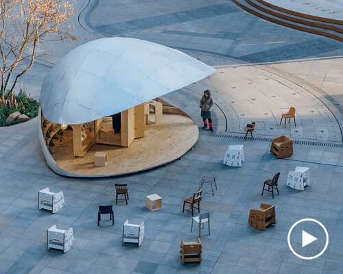 this tiny community library in beijing can open and shut like a clamshell