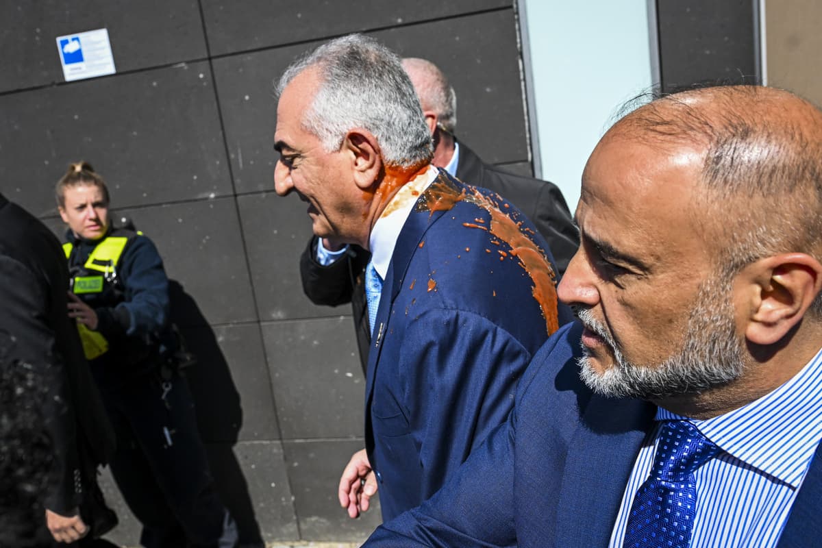 Red liquid thrown at Iranian opposition figure Reza Pahlavi during Germany visit